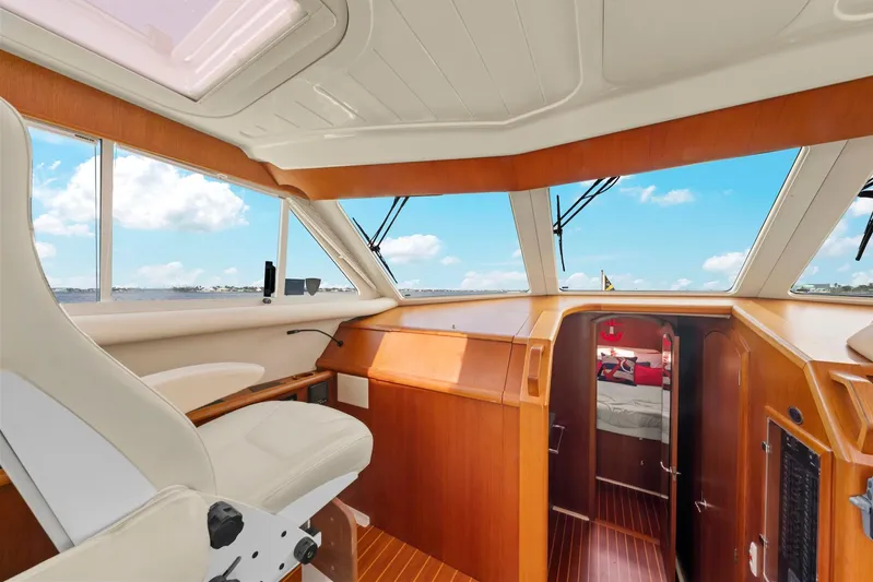 Lady Di Yacht Photos Pics Interior of 2007 Oyster LD43 yacht with wooden finish and panoramic windows.