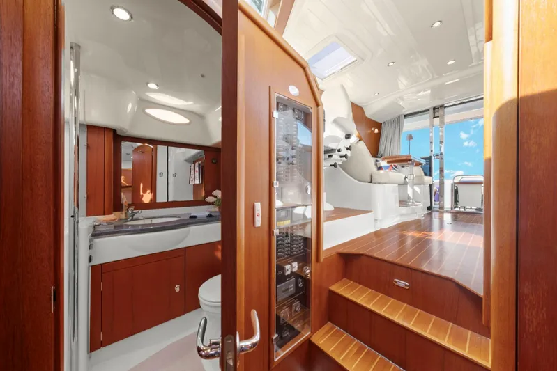Lady Di Yacht Photos Pics Interior of 2007 Oyster LD43 yacht, featuring wooden cabinetry and modern design elements.