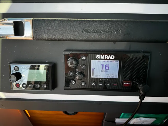 Lemaire Yacht Photos Pics Simrad marine electronics on 2023 Axopar 28 CABIN dashboard.