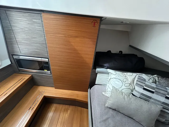  Yacht Photos Pics Interior of 2019 Tiara Yachts 38 LS with modern design and cozy seating area.