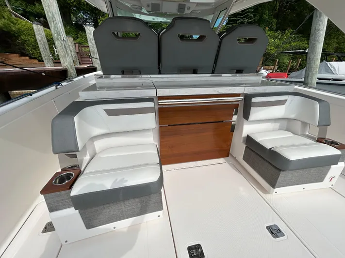  Yacht Photos Pics 2019 Tiara Yachts 38 LS interior seating with modern design and luxurious finishes.