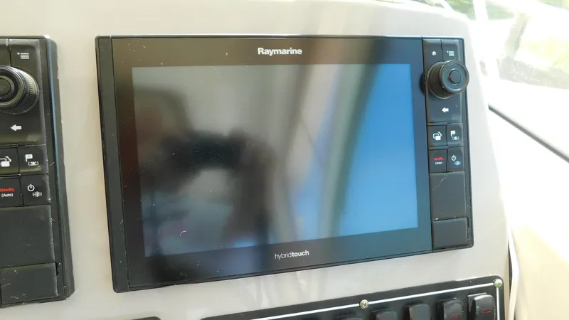  Yacht Photos Pics Raymarine navigation display on 2017 Boston Whaler 315 Conquest boat dashboard.