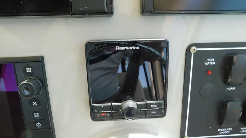  Yacht Photos Pics Control panel of 2017 Boston Whaler 315 Conquest with Raymarine display.