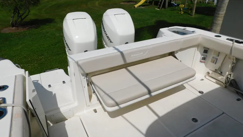  Yacht Photos Pics 2017 Boston Whaler 315 Conquest boat with dual engines and foldable bench seat.