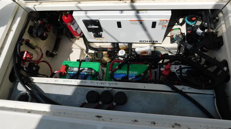  Yacht Photos Pics Engine compartment of a 2017 Boston Whaler 315 Conquest with Kohler generator and batteries.