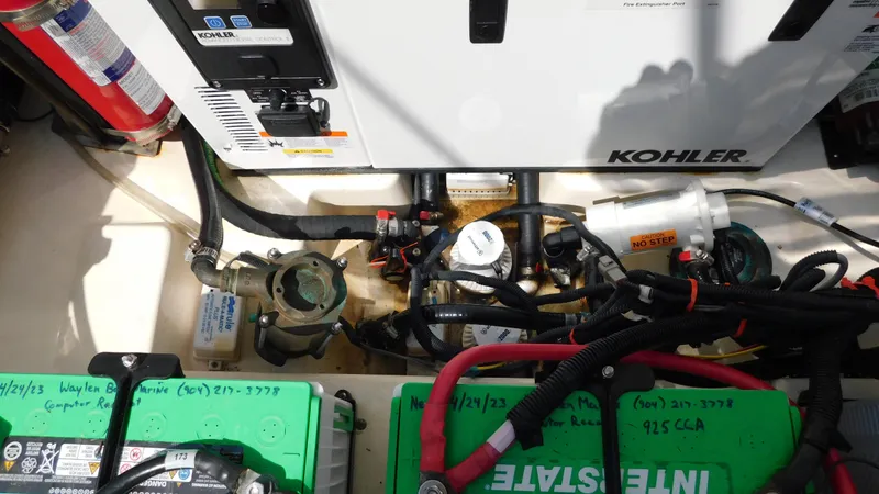  Yacht Photos Pics Engine compartment of a 2017 Boston Whaler 315 Conquest with Kohler generator and batteries.