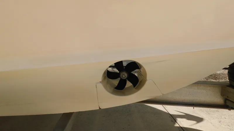  Yacht Photos Pics 2017 Boston Whaler 315 Conquest boat hull with visible propeller detail.