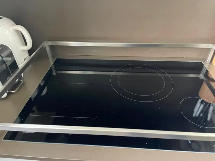  Yacht Photos Pics Modern kitchen stove with glass top on Sanlorenzo SL86 yacht, 2017 model.