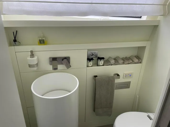  Yacht Photos Pics Luxurious bathroom interior of 2017 Sanlorenzo SL86 yacht, featuring modern fixtures and elegant design.