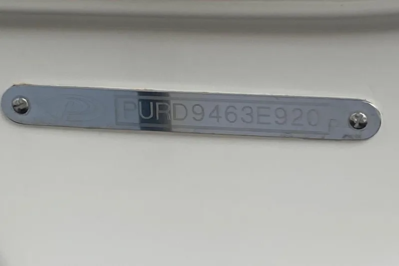 Perfect Draw Yacht Photos Pics Metallic identification plate on a 2020 Pursit DC 325 boat.