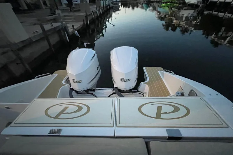 Perfect Draw Yacht Photos Pics 2020 Pursit DC 325 boat with twin 300 engines docked at marina.