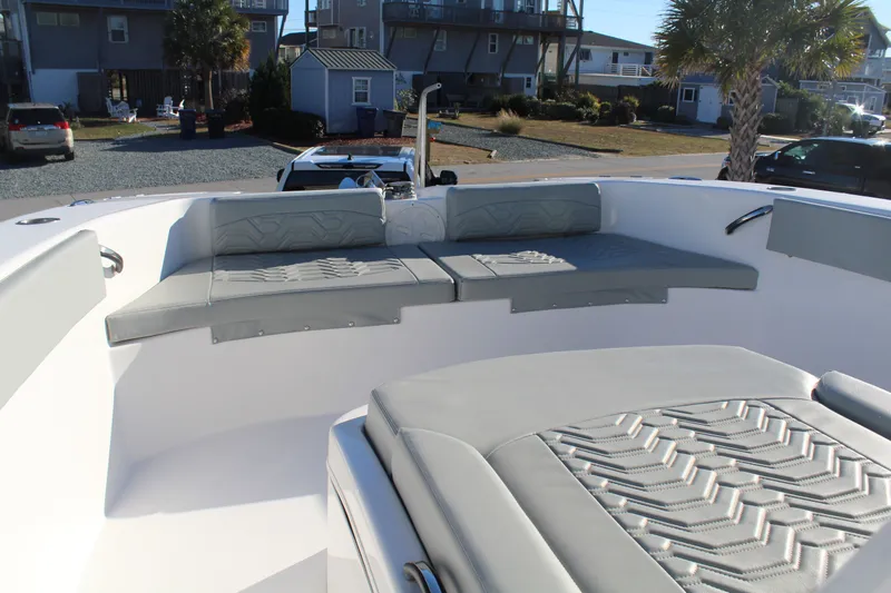  Yacht Photos Pics Interior view of 2022 Twin Vee 280 GFX boat with gray upholstery.