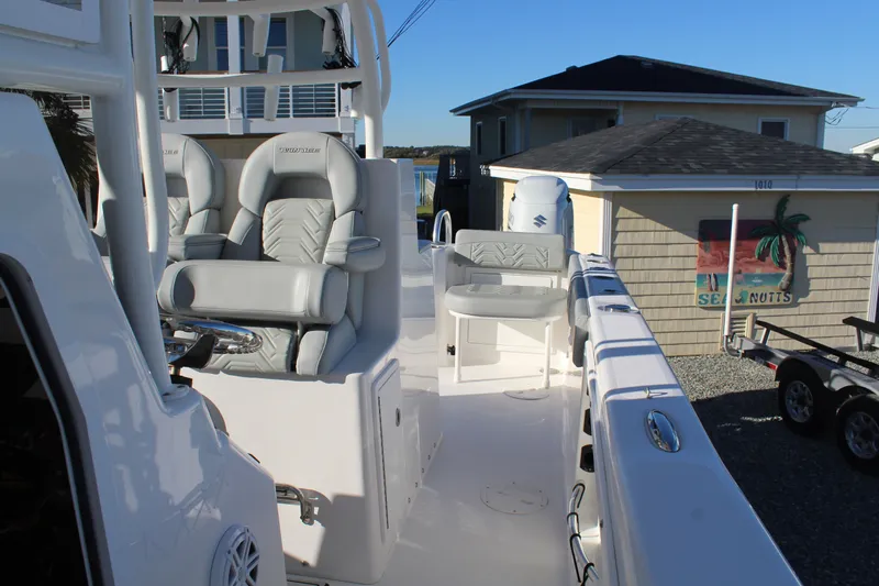  Yacht Photos Pics Interior view of a 2022 Twin Vee 280 GFX boat with gray seating.