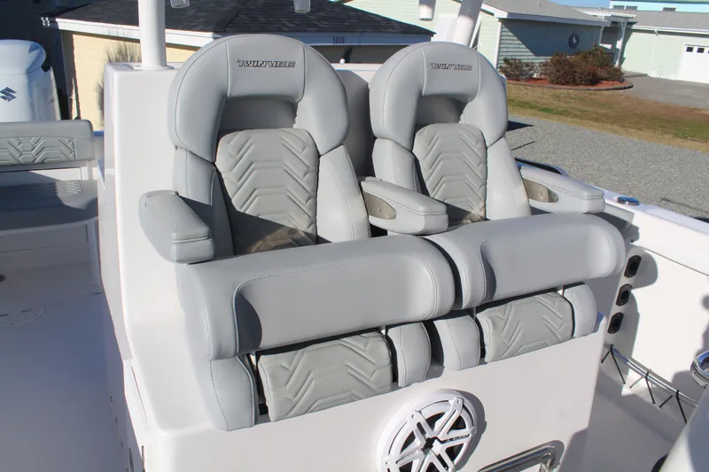  Yacht Photos Pics 2022 Twin Vee 280 GFX boat seats, gray upholstery.