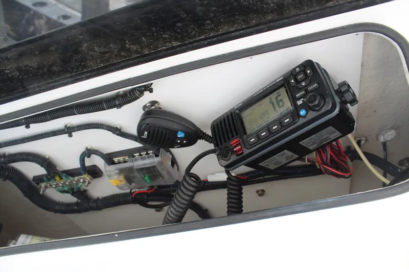  Yacht Photos Pics Interior view of a 2022 Twin Vee 280 GFX with radio equipment.