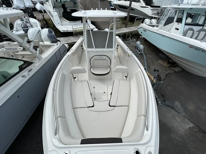  Yacht Photos Pics 2024 Sailfish 242CC center console boat with spacious seating and modern design.