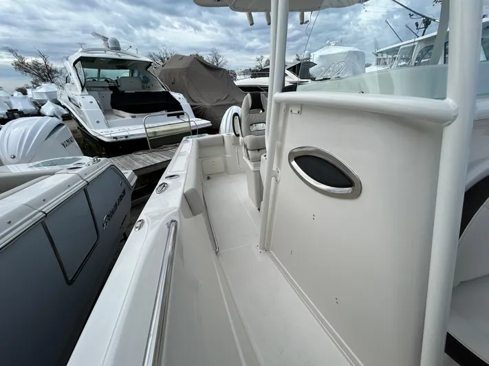  Yacht Photos Pics 2024 Sailfish 242CC boat interior view at marina.