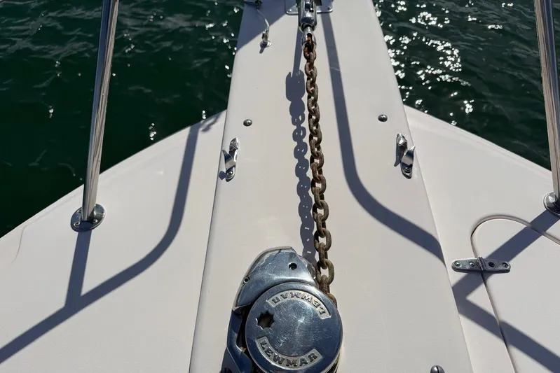  Yacht Photos Pics 2009 Grady-White Express 330 boat deck with anchor chain and winch.