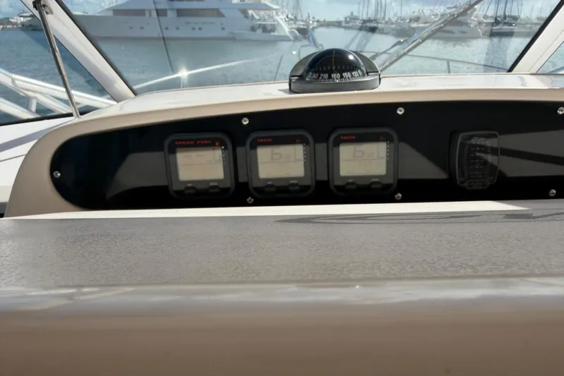  Yacht Photos Pics 2009 Grady-White Express 330 dashboard with navigation instruments and compass.