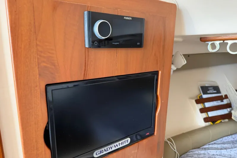  Yacht Photos Pics 2009 Grady-White Express 330 interior with Fusion stereo and TV.