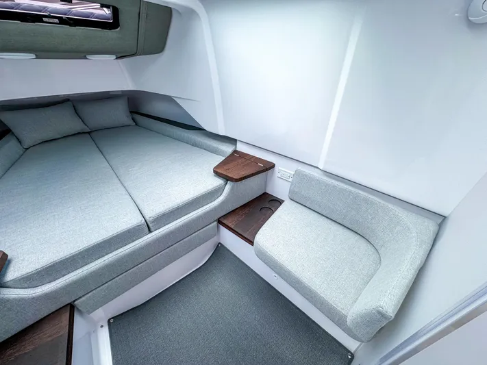  Yacht Photos Pics 2024 Axopar 37XC CROSS CABIN interior with modern seating and sleek design.