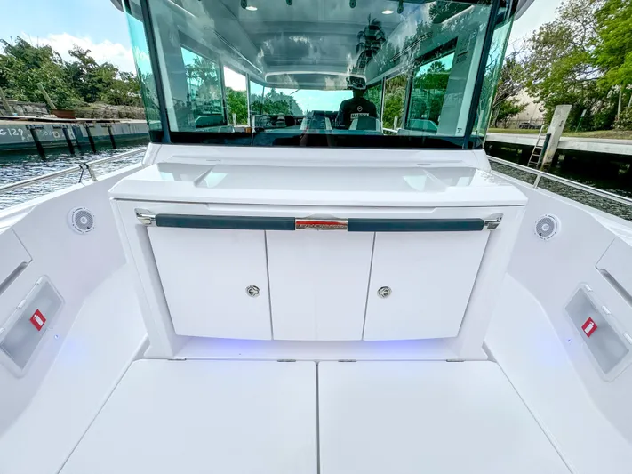  Yacht Photos Pics 2024 Axopar 37XC CROSS CABIN boat interior with sleek design and modern amenities.
