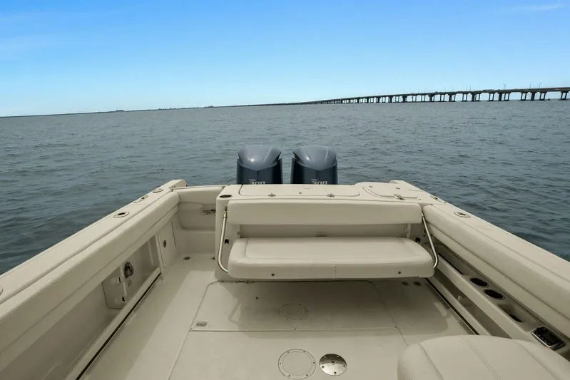 Patsy Ru Yacht Photos Pics 2016 Grady-White 285 Freedom boat on water, featuring dual engines and spacious deck.