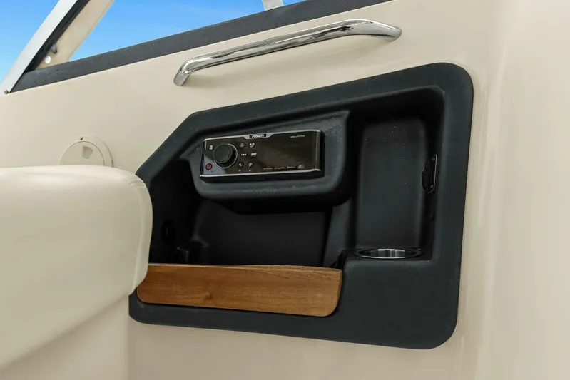 Patsy Ru Yacht Photos Pics 2016 Grady-White 285 Freedom boat interior with built-in stereo system.