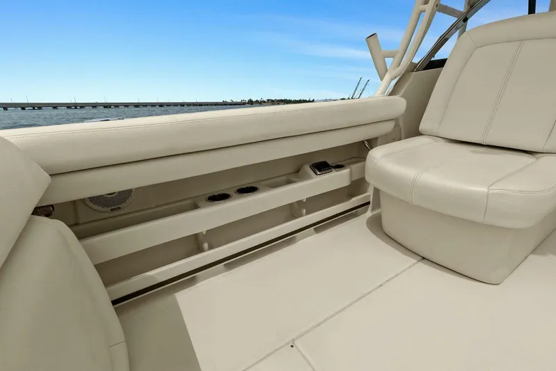 Patsy Ru Yacht Photos Pics 2016 Grady-White 285 Freedom boat interior with beige seating and ocean view.