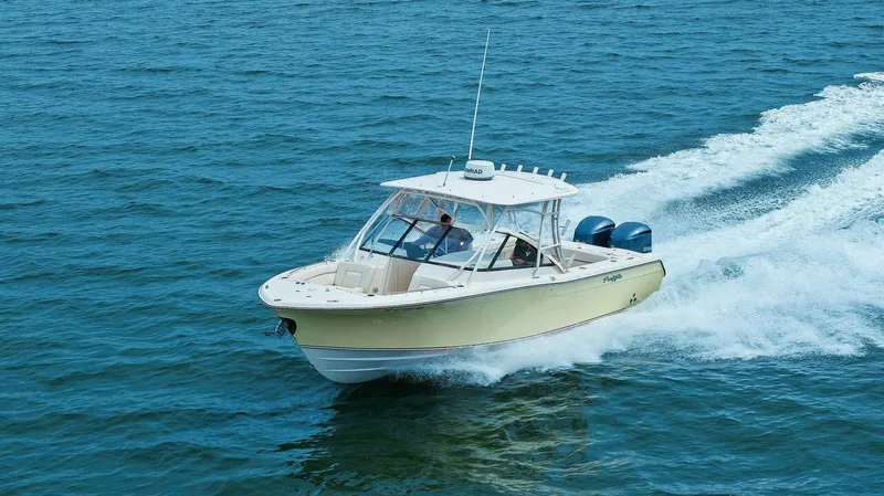 Patsy Ru Yacht Photos Pics 2016 Grady-White 285 Freedom boat cruising on open water, showcasing speed and design.