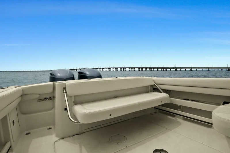 Patsy Ru Yacht Photos Pics 2016 Grady-White 285 Freedom boat interior with ocean view and bridge in background.