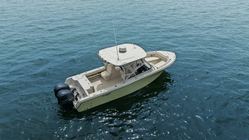 Patsy Ru Yacht Photos Pics 2016 Grady-White 285 Freedom boat on open water, featuring dual engines.