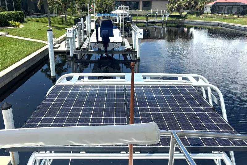 Imagine Yacht Photos Pics Solar panels on a 2000 Fountaine Pajot Maryland 37 yacht docked by a canal.