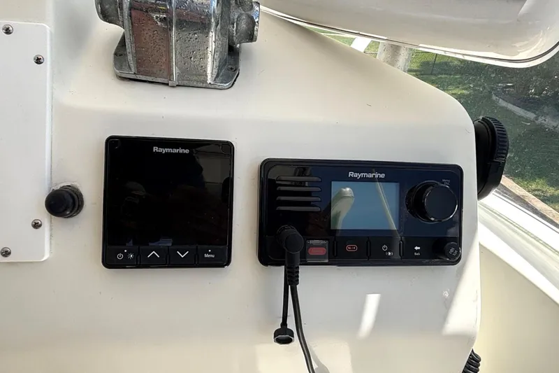 Imagine Yacht Photos Pics Raymarine navigation equipment on 2000 Fountaine Pajot Maryland 37 yacht dashboard.