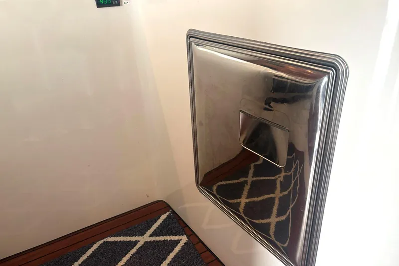 Imagine Yacht Photos Pics Stainless steel hatch on 2000 Fountaine Pajot Maryland 37 yacht interior.