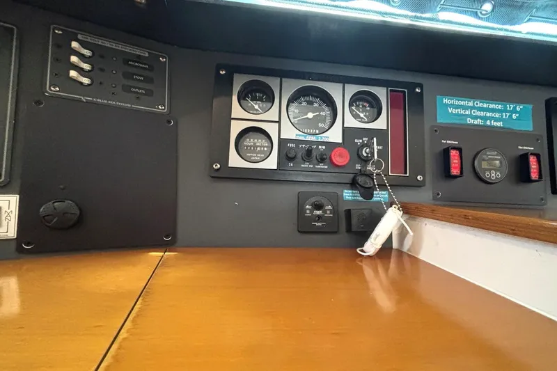 Imagine Yacht Photos Pics Control panel of a 2000 Fountaine Pajot Maryland 37 boat, featuring gauges and switches.