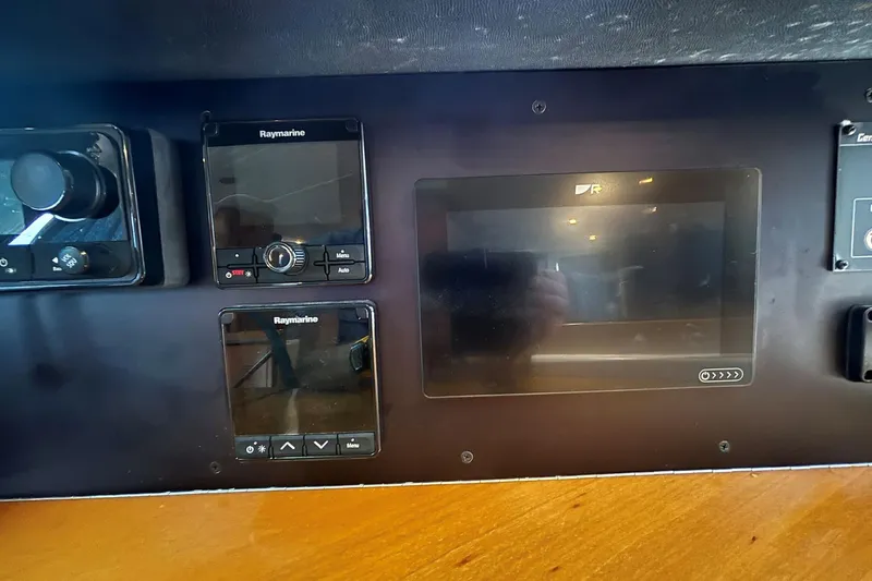 Imagine Yacht Photos Pics Control panel of a 2000 Fountaine Pajot Maryland 37 with Raymarine navigation equipment.