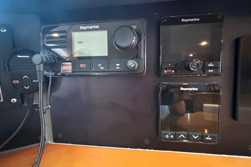 Imagine Yacht Photos Pics Raymarine navigation equipment on 2000 Fountaine Pajot Maryland 37 yacht dashboard.