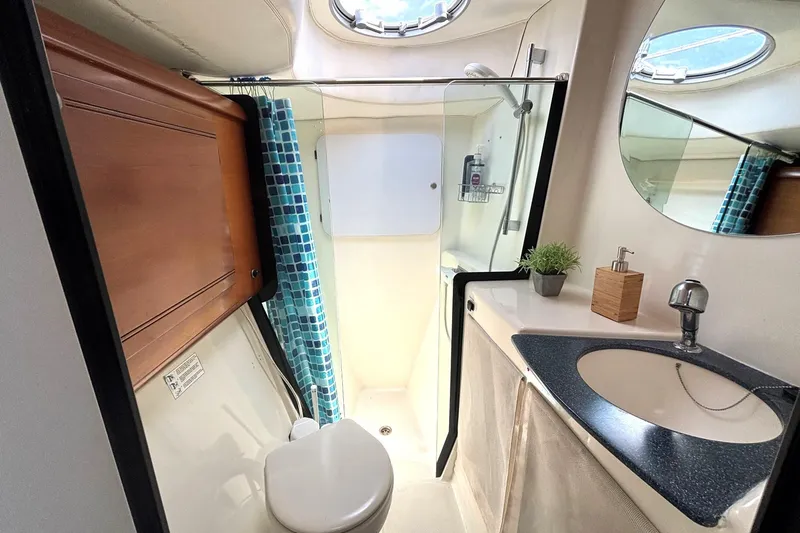 Imagine Yacht Photos Pics Bathroom interior of 2000 Fountaine Pajot Maryland 37 yacht with shower and sink.