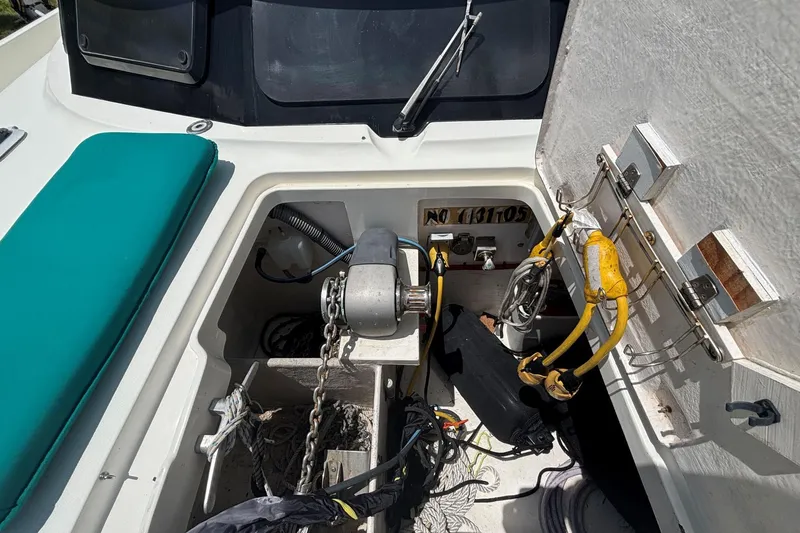 Imagine Yacht Photos Pics Anchor compartment of 2000 Fountaine Pajot Maryland 37 with equipment and ropes.