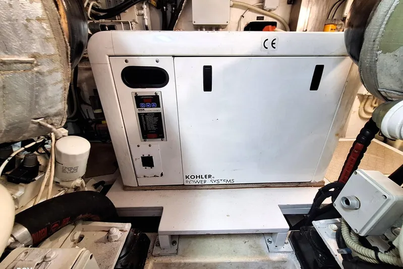 Domale Yacht Photos Pics Engine room of 2009 Pershing 56 yacht featuring Kohler power systems.