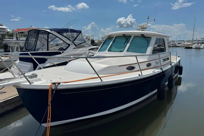 Mary Time Yacht Photos Pics 2013 Back Cove 30 boat docked in a marina under a clear blue sky.