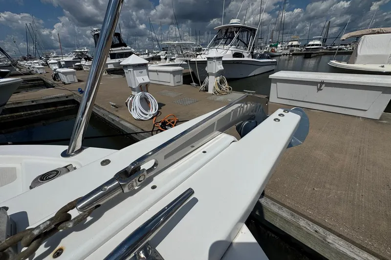 Mary Time Yacht Photos Pics 2013 Back Cove 30 yacht docked at marina under cloudy sky.