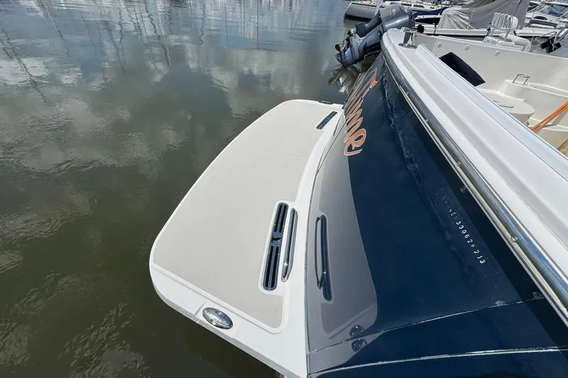 Mary Time Yacht Photos Pics 2013 Back Cove 30 boat stern view with swim platform in marina.