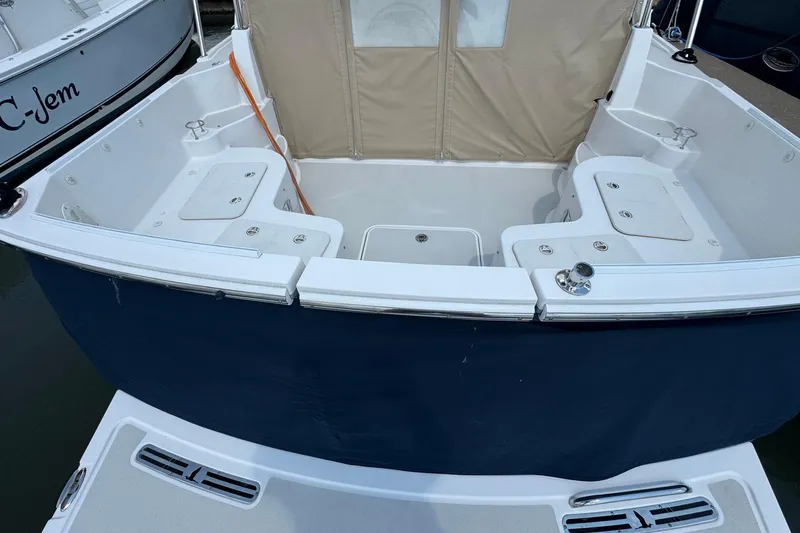 Mary Time Yacht Photos Pics 2013 Back Cove 30 boat stern with seating and storage compartments.