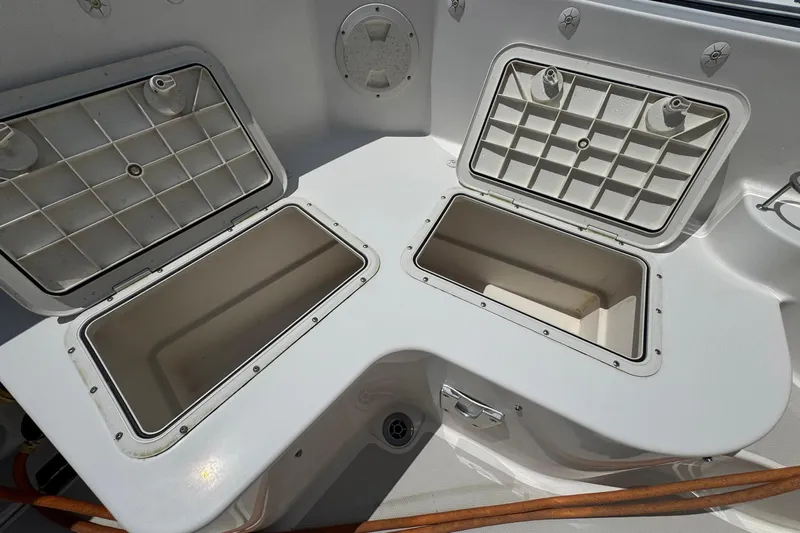 Mary Time Yacht Photos Pics Open storage compartments on a 2013 Back Cove 30 boat deck.