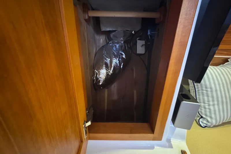 Mary Time Yacht Photos Pics Interior view of a 2013 Back Cove 30 boat cabinet with wiring and insulation.