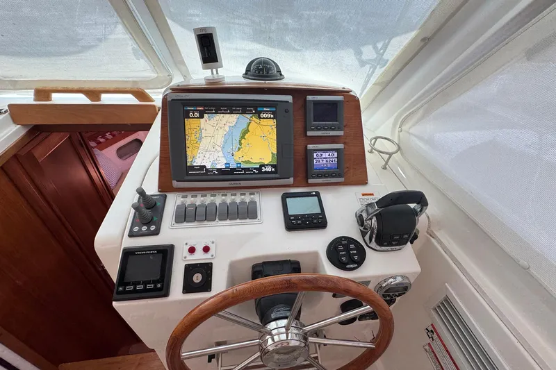Mary Time Yacht Photos Pics Helm of 2013 Back Cove 30 boat with navigation and control instruments.