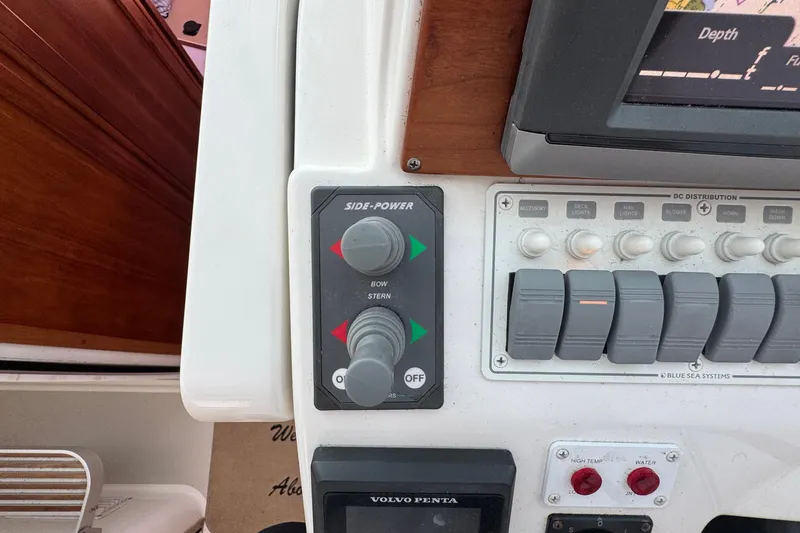 Mary Time Yacht Photos Pics Control panel of a 2013 Back Cove 30 boat with Side-Power thruster controls.