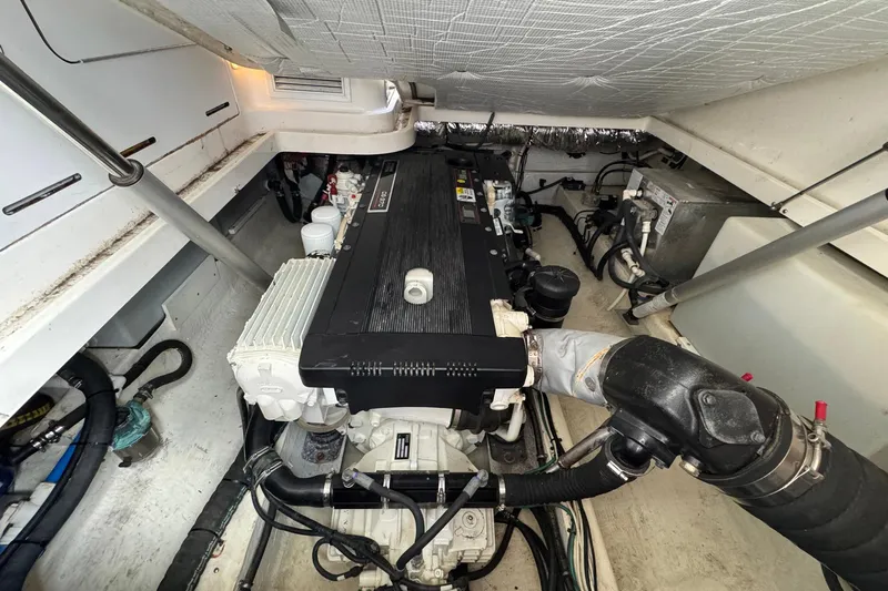 Mary Time Yacht Photos Pics Engine room of a 2013 Back Cove 30 boat, showcasing mechanical components.